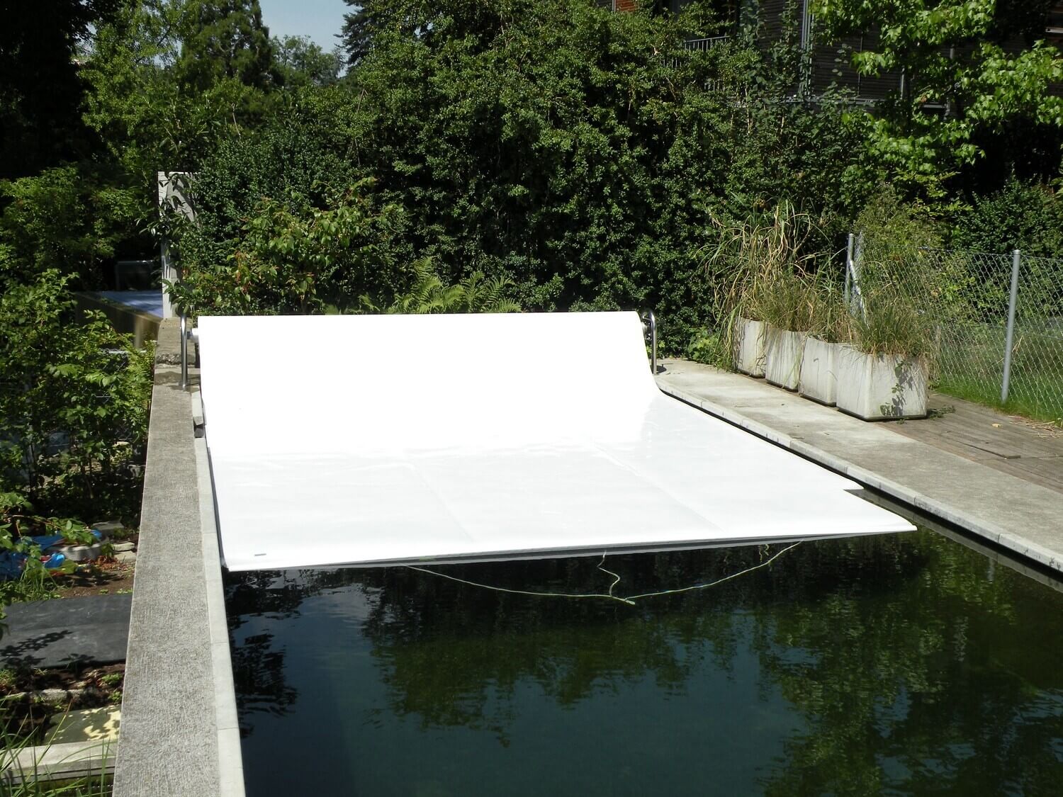ISOLA Abdeckung mit manueller Aufrollvorrichtung